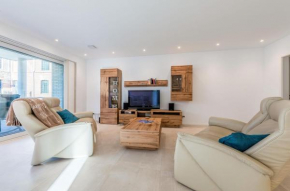 Pusteblume - Barrierefreie 5-Sterne-Ferienwohnung mit Seeblick und Sauna, Amt Malchow